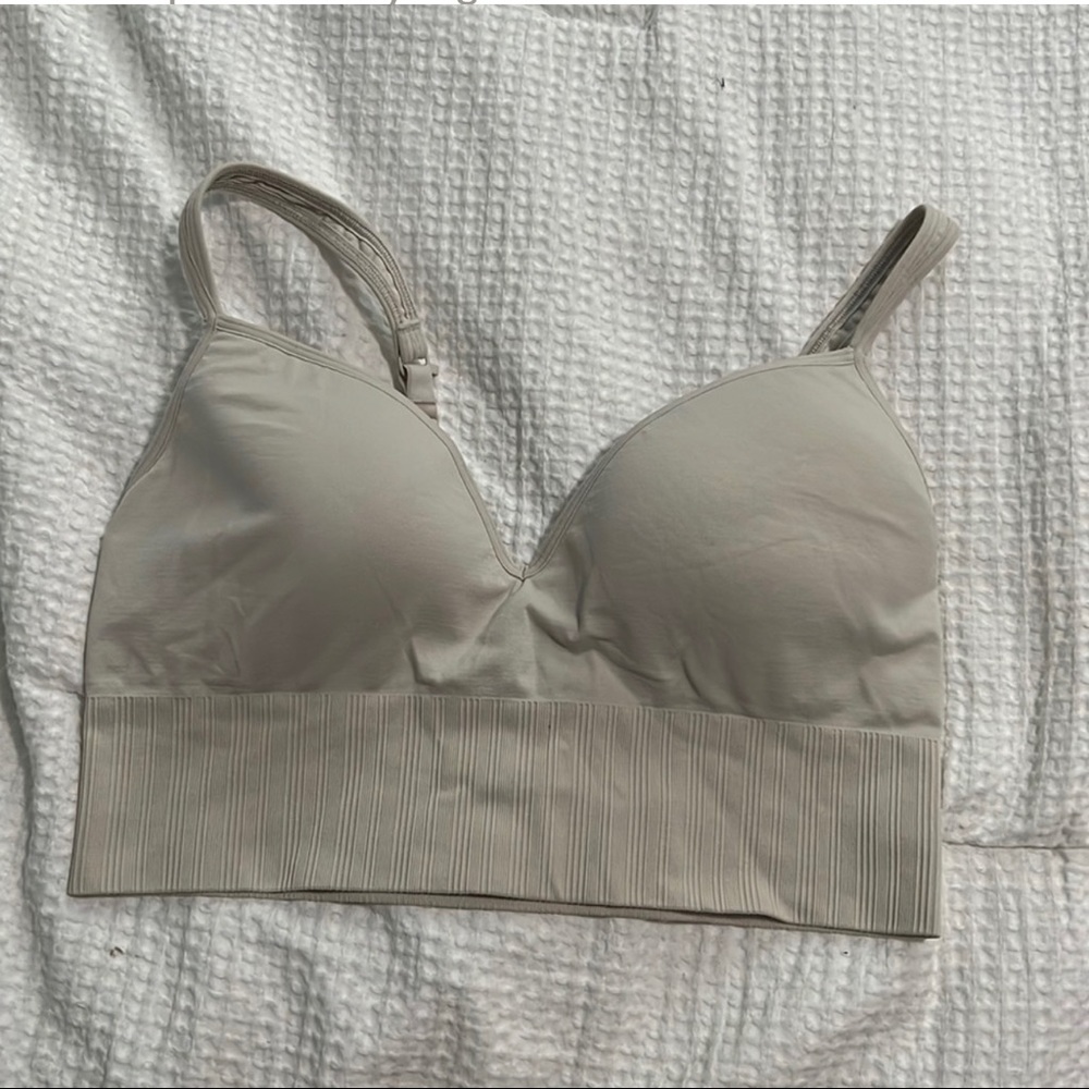 Athleta bra medium in A-C cup. Can be worn as racer back. Comfortable wide band.